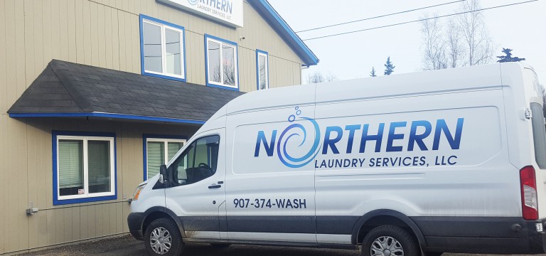 Northern Laundry Service van parked outside of their business in Alaska. Northern Laundry Service van parked outside of their business in Alaska.