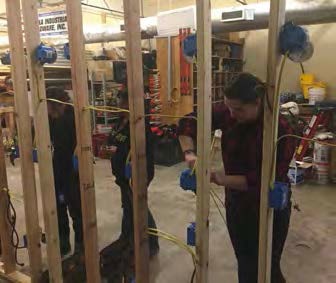 Students get a taste of the electrical trade in a Women in the Trades class run by the Alaska Works Partnership. Students get a taste of the electrical trade in a Women in the Trades class run by the Alaska Works Partnership.