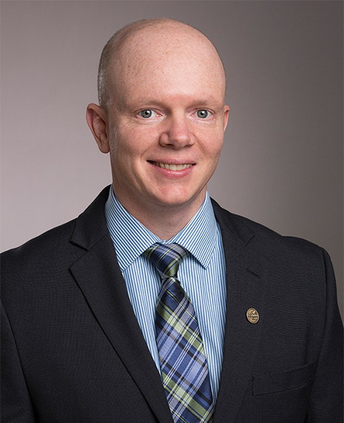 Ryan Caldwell Ryan Caldwell smiling in a professional portrait