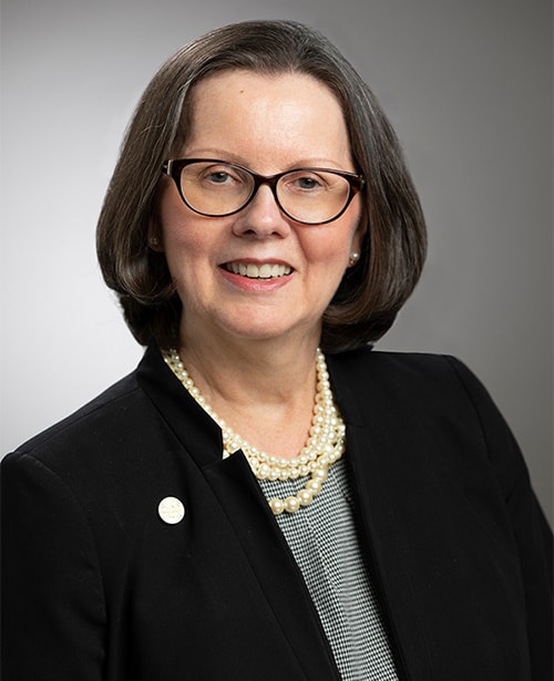 Susan Stenstrom Susan Stenstrom smiling in a professional portrait