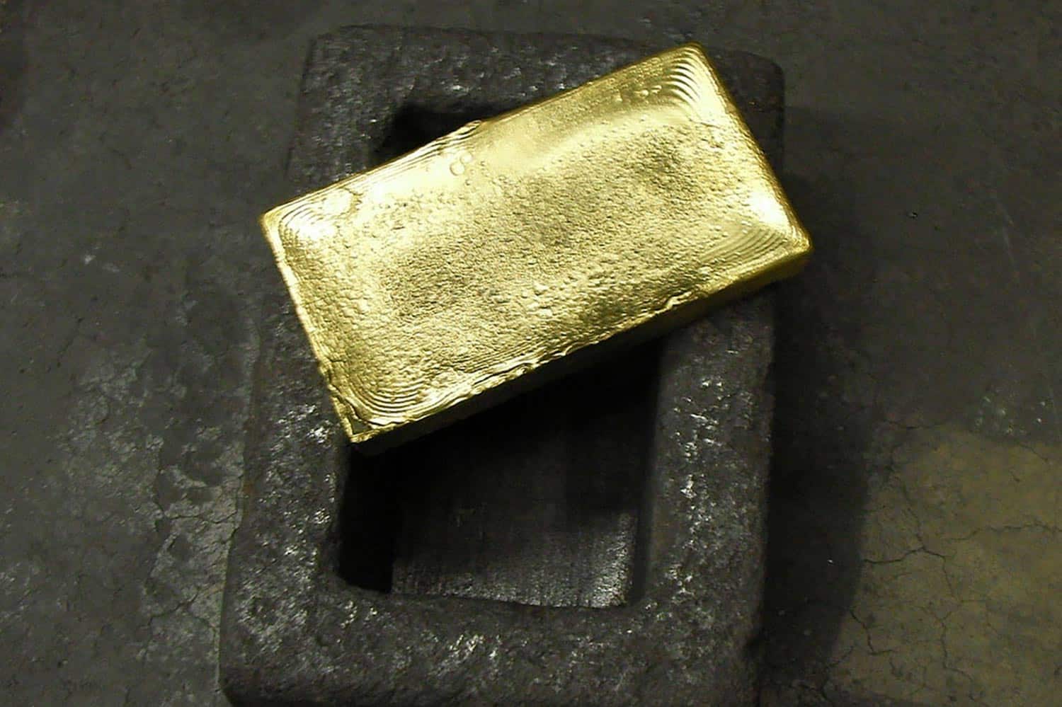 a gold bar fresh out of a mold