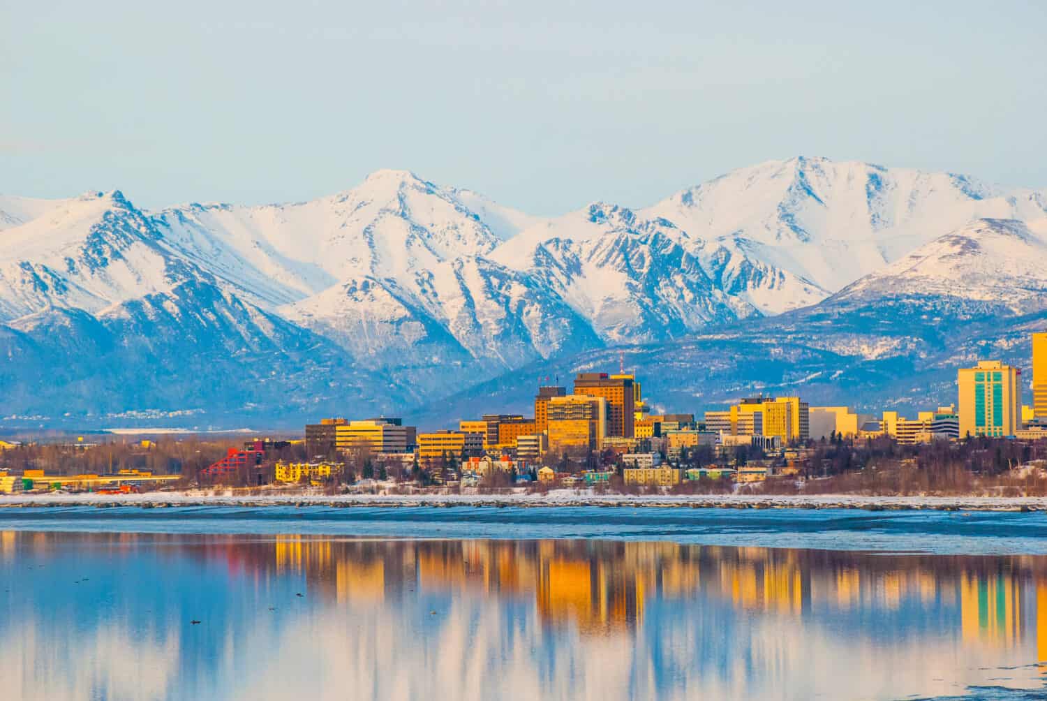 Downtown Anchorage Alaska and its reflection into Cook Inlet.