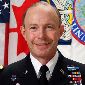 General Charles H. Jacoby Jr smiling and in uniform