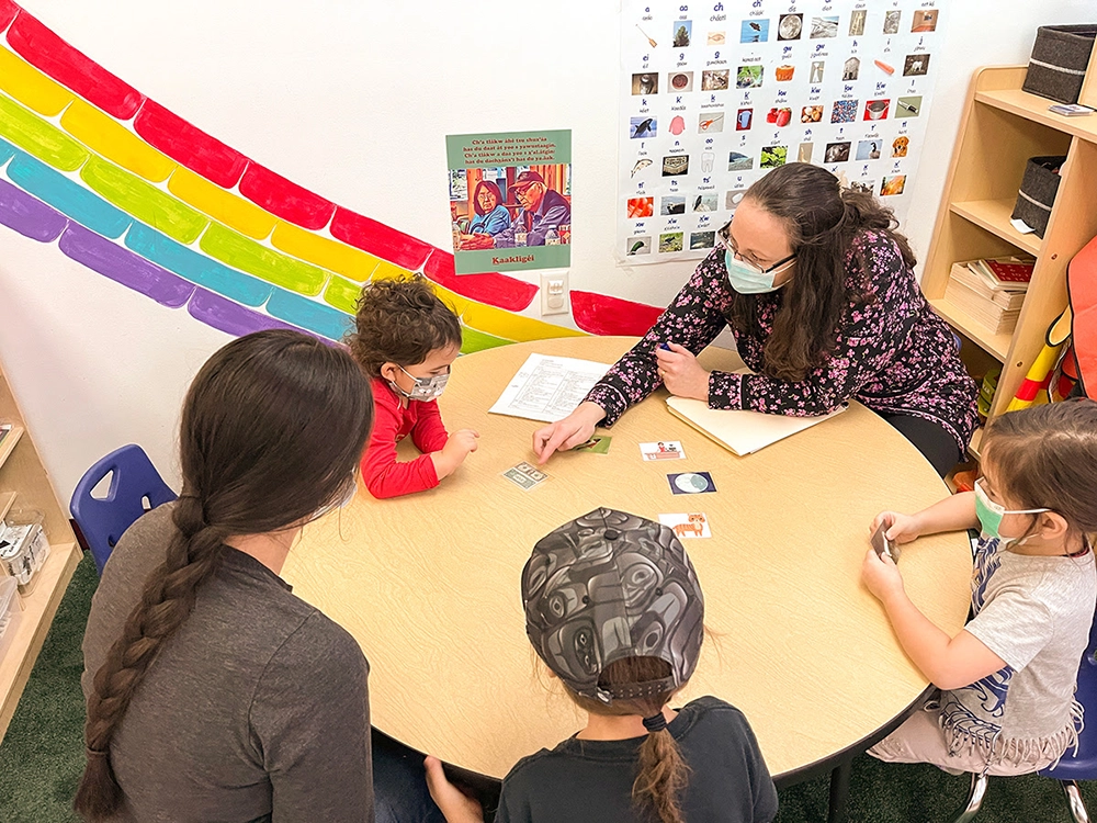 Teacher teaching kids in in preschool