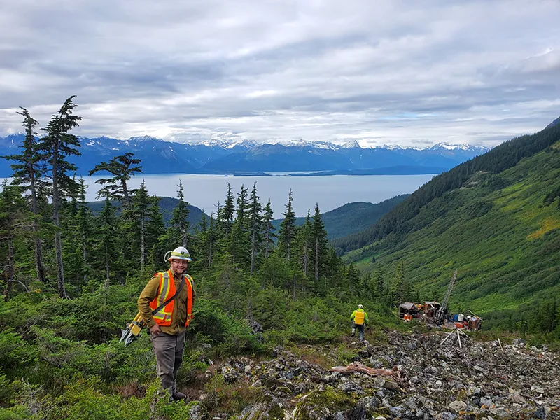 Mining worker with view of mountains